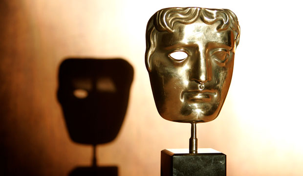 A BAFTA award in the shape of an ancient Greek theatrical mask.